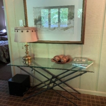 Glass topped console table