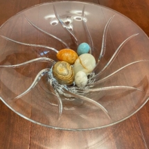 Crystal bowl with stone eggs
