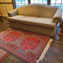 Nice wool rug and sofa bed