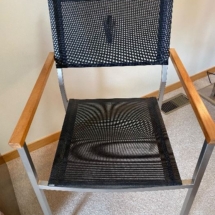 Pair of aluminum outdoor mesh chairs by Gloster - like new