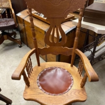 Antique pressed back swivel desk chair