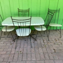 Wrought iron patio set- Salterini? Table should probably have a glass top.