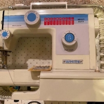 White, heavy duty sewing machine