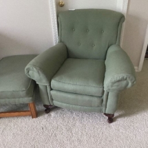 Upholstered chair and ottoman