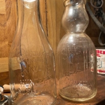 Grayling and Saginaw dairy glass bottles