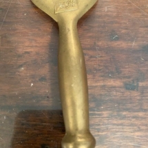 Antique brass Schlitz bottle opener