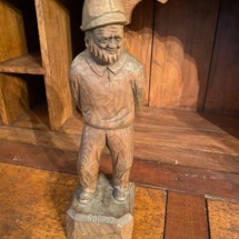 Antique carved wooden man