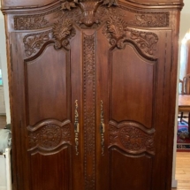 Stunning carved antique armoire