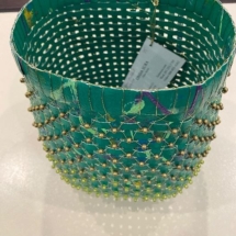 Woven green basket by Linda Sura