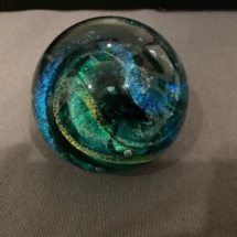Glass paperweight signed by Shawn Messenger