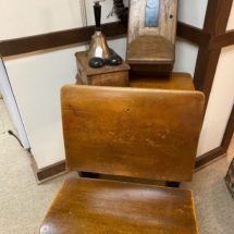 Antique wood phones and antique school desk