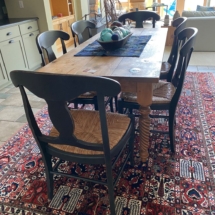 Beautiful dining table with 6 rush seat chairs