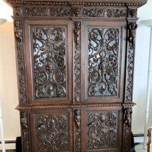 Antique carved walnut armoire