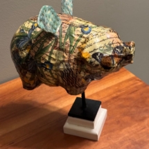 Signed paper mache flying pig