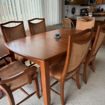 Dining Room table with two extra leaves and 8 chairs. Made in Canada. 